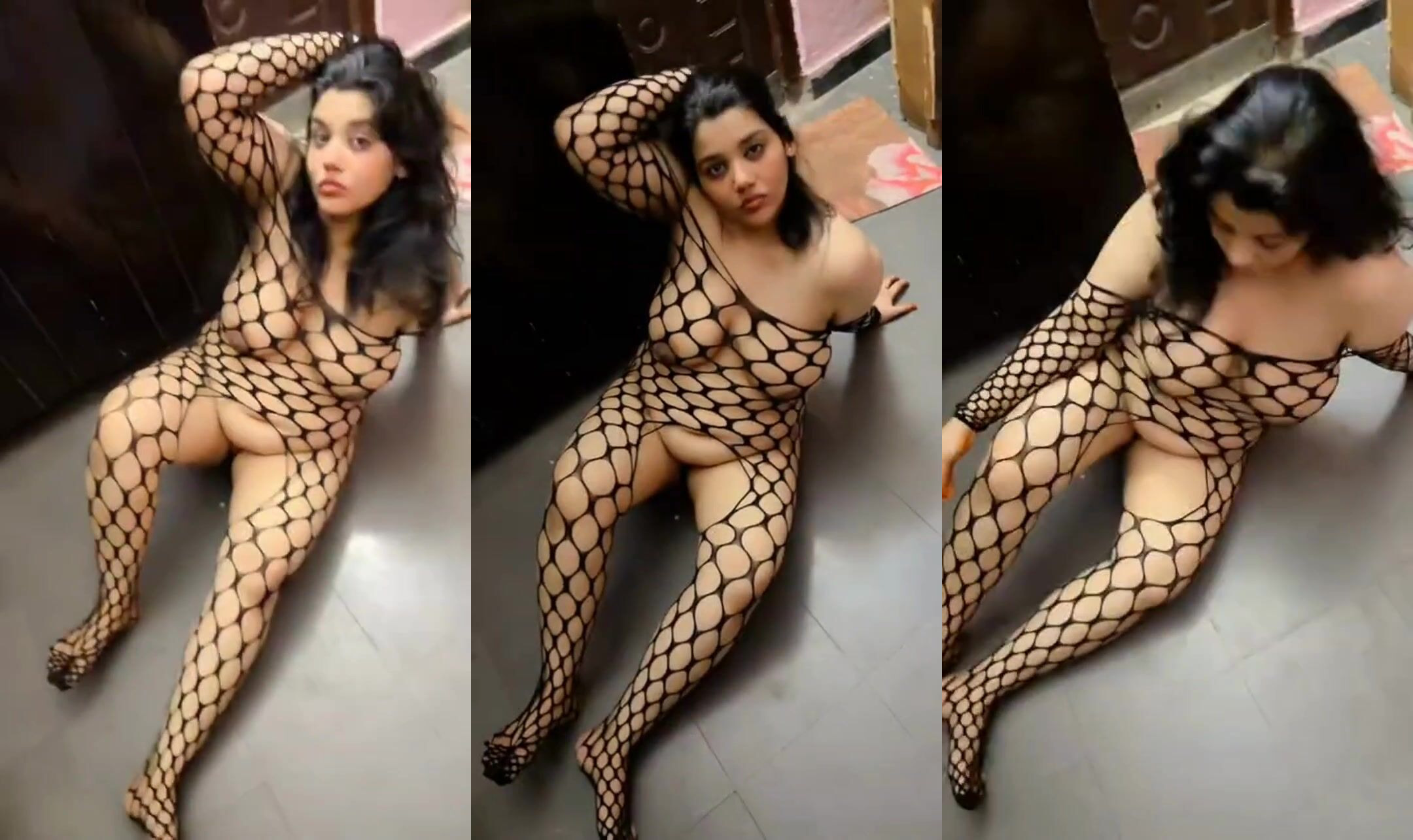 Sexy Indian Aunty’s seductive poses wearing netted lingerie